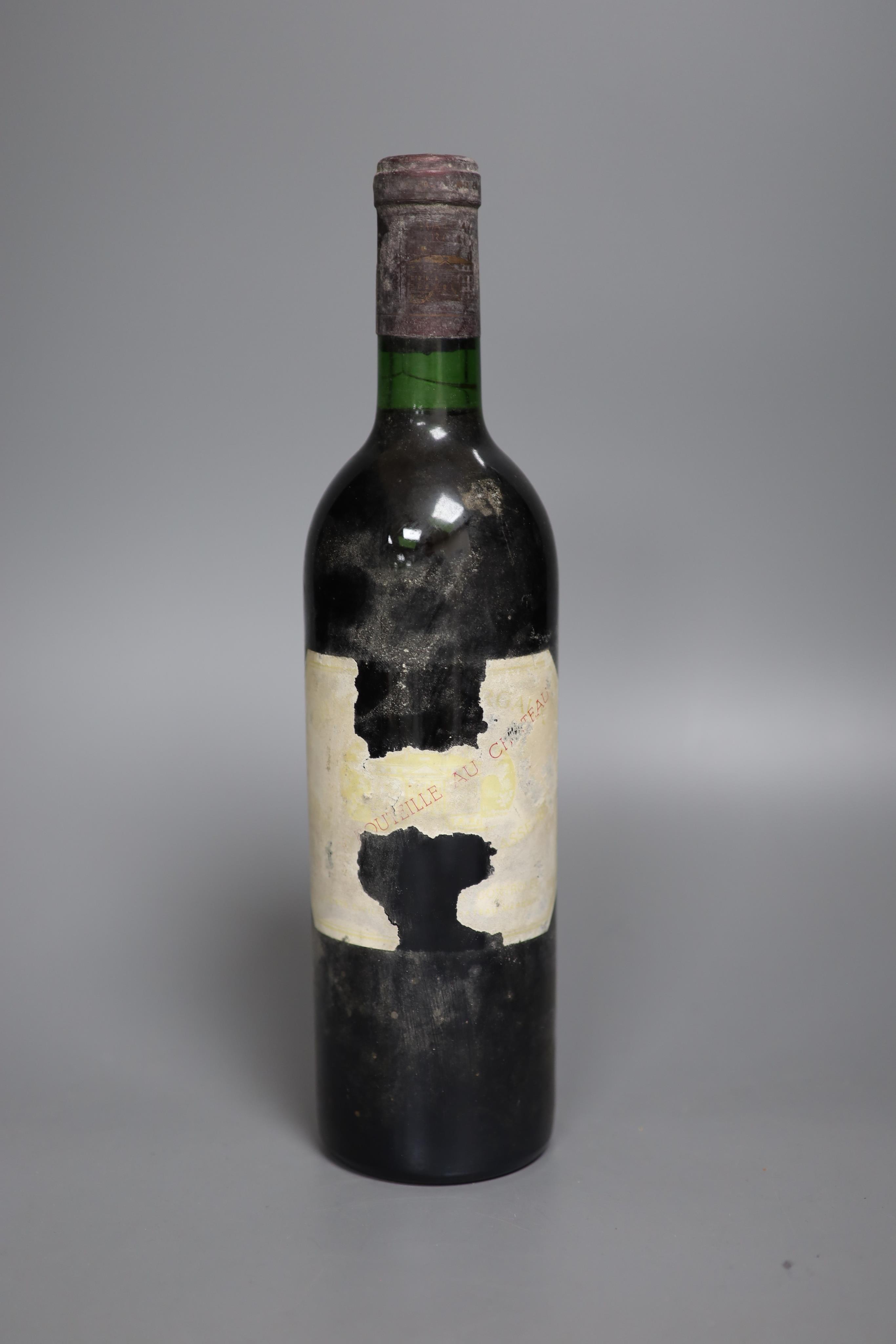 One bottle of Chateau Margaux, label very bleached and torn, year unknown.